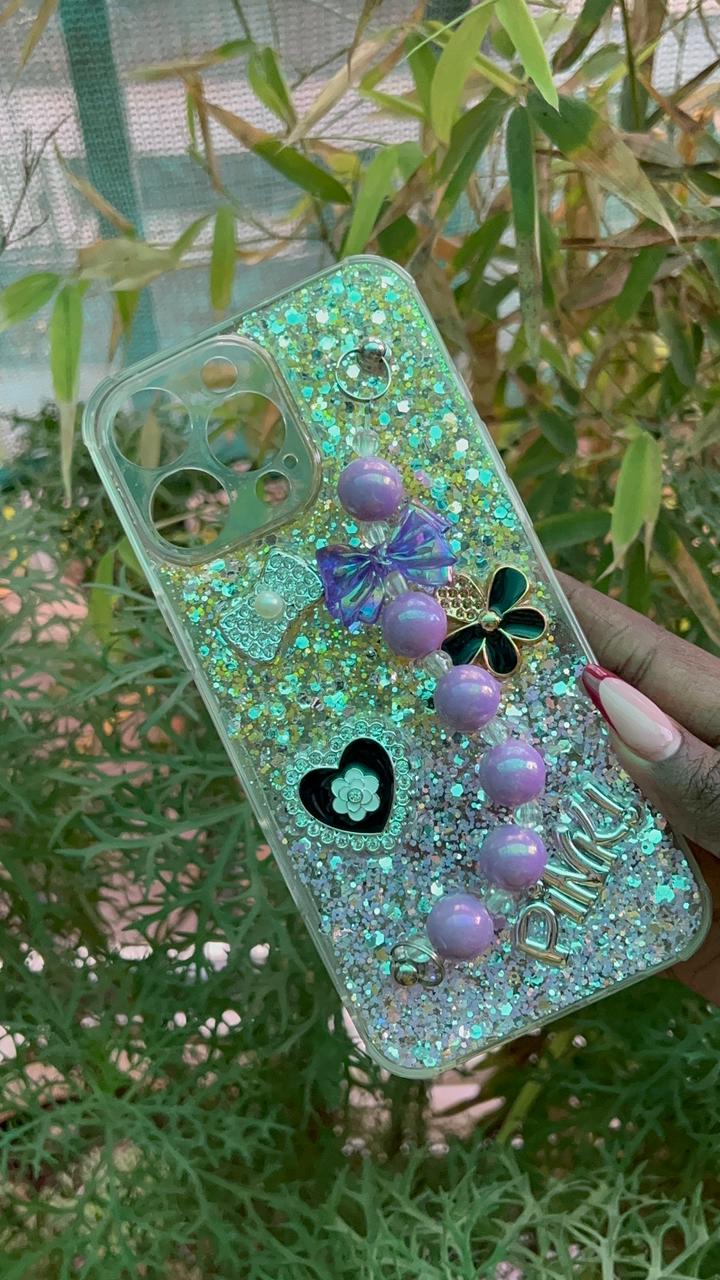 Crystal Luxe Pinku Chain Case – iPhone 16 Pro Max (Full Glitter with Purple Beaded Hand Chain)