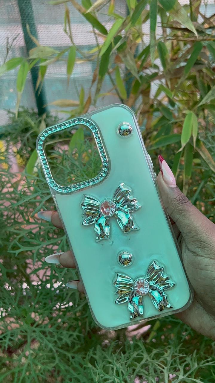 Silver Ribbon Bloom Case – iPhone 14 Pro (Clear with 3D Resin Ribbons & Crystal Gems)