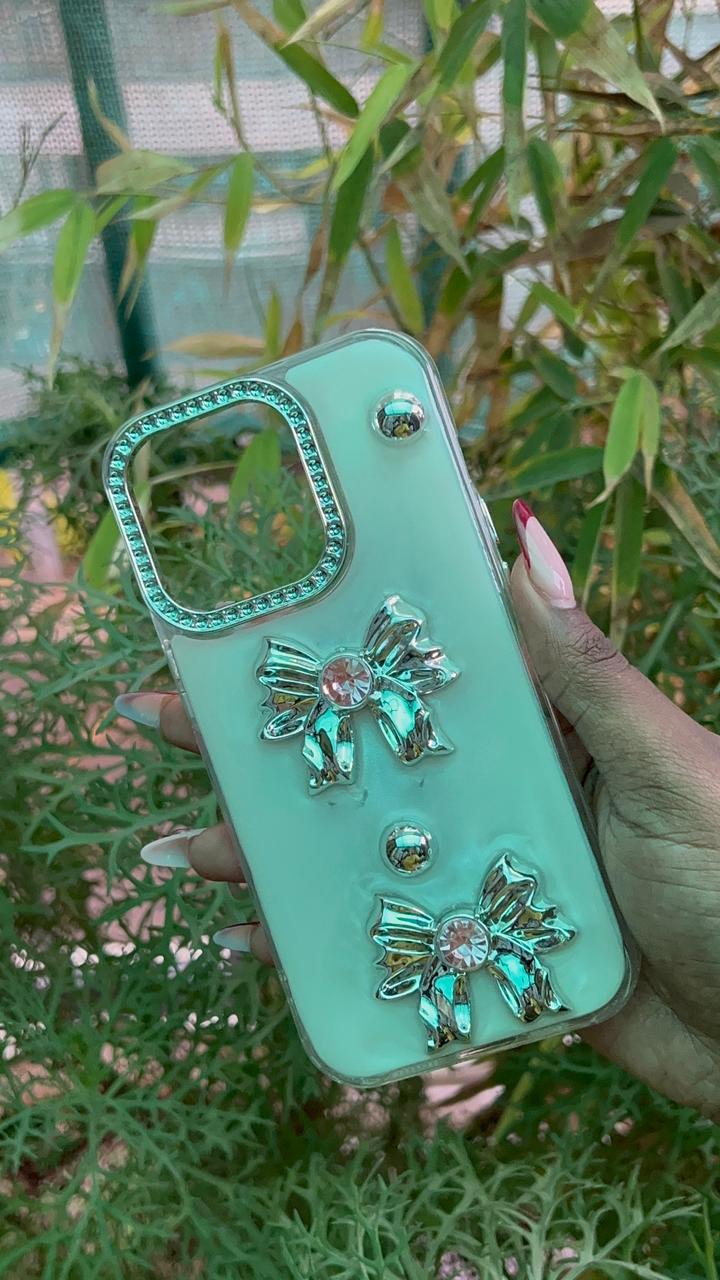 Silver Ribbon Bloom Case – iPhone 14 Pro (Clear with 3D Resin Ribbons & Crystal Gems)