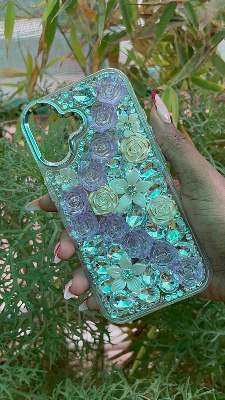 Crystal Bloom Garden Case – iPhone 16 (Purple & Gold Floral with Clear Rhinestones)